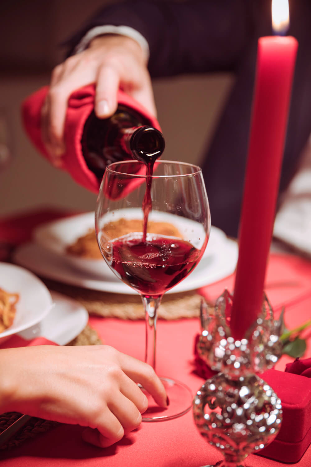 https://kimerawineshop.com/wp-content/uploads/2023/01/man-pouring-wine-glass-festive-table